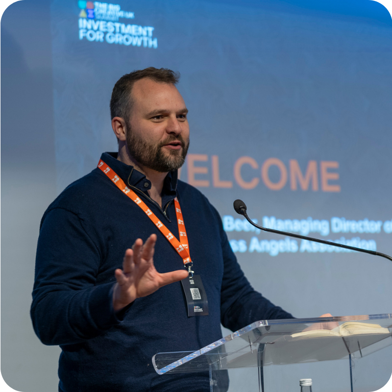 Investor speaks at a pitching event